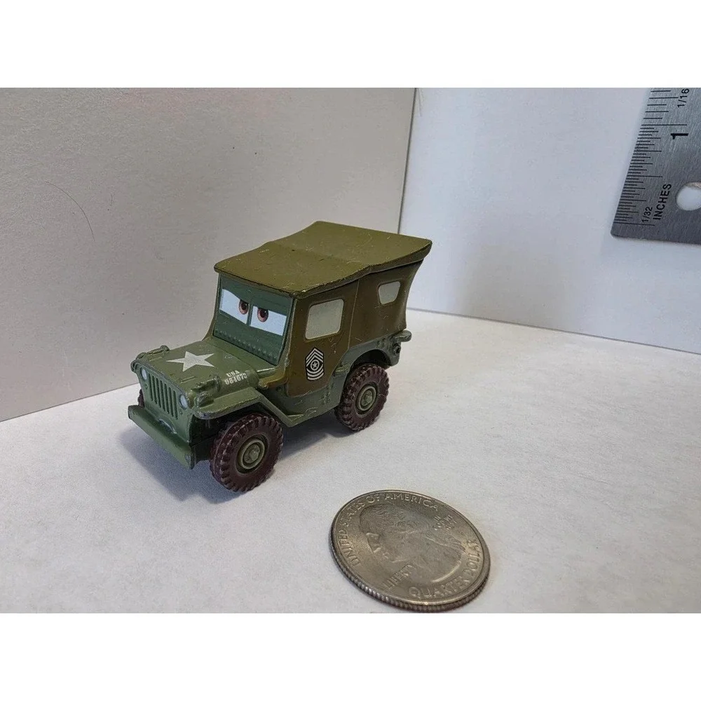 Disney/Pixar Cars Sarge diecast vehicle, specifically from the 1:55 scale Mattel